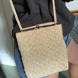 Vintage cream and golden purse